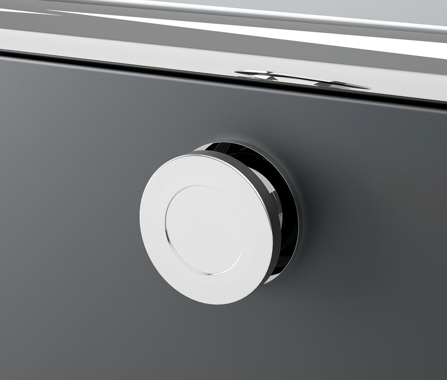 Gros plan sur une commode en métal grise CN3 avec une poignée ronde argentée.