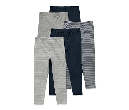 Cinq leggings pour enfant de différentes couleurs et motifs.