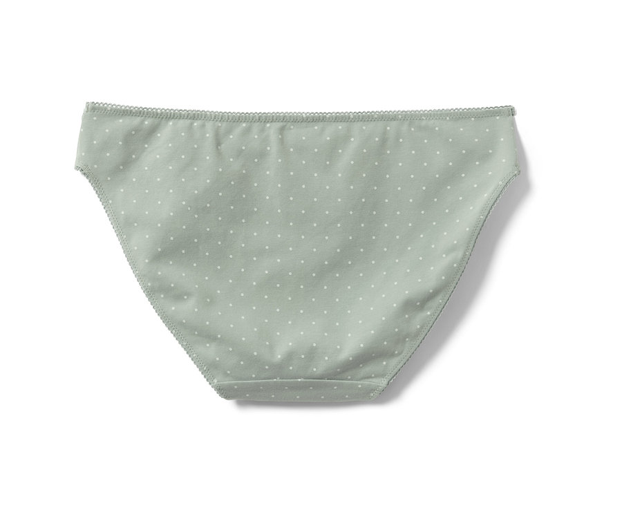 Une culotte verte avec des pois blancs.