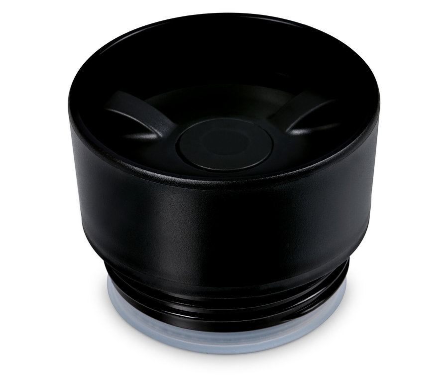 Gros plan du couvercle noir d'un gobelet à café to-go.