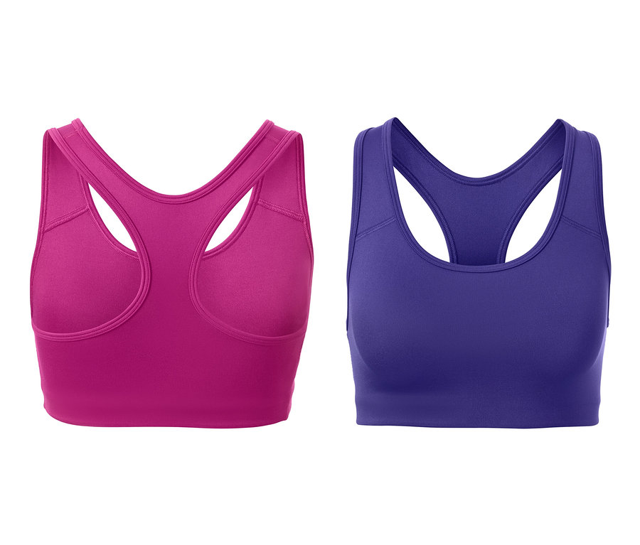 Deux brassières de sport : une fuchsia et une violet foncé.