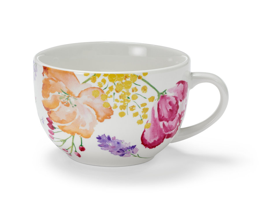 Un bol à café au lait blanc avec un motif floral.