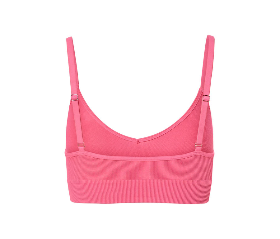 Gros plan d'une brassière seamless rose.