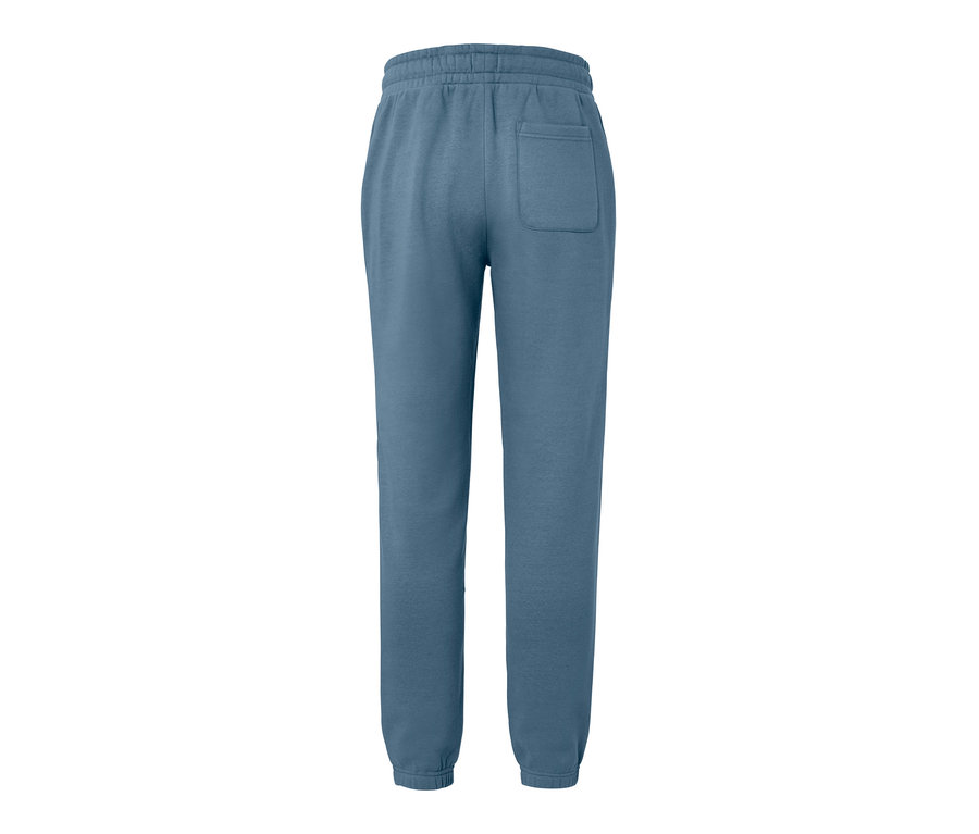 Pantalon de survêtement bleu avec poche arrière.