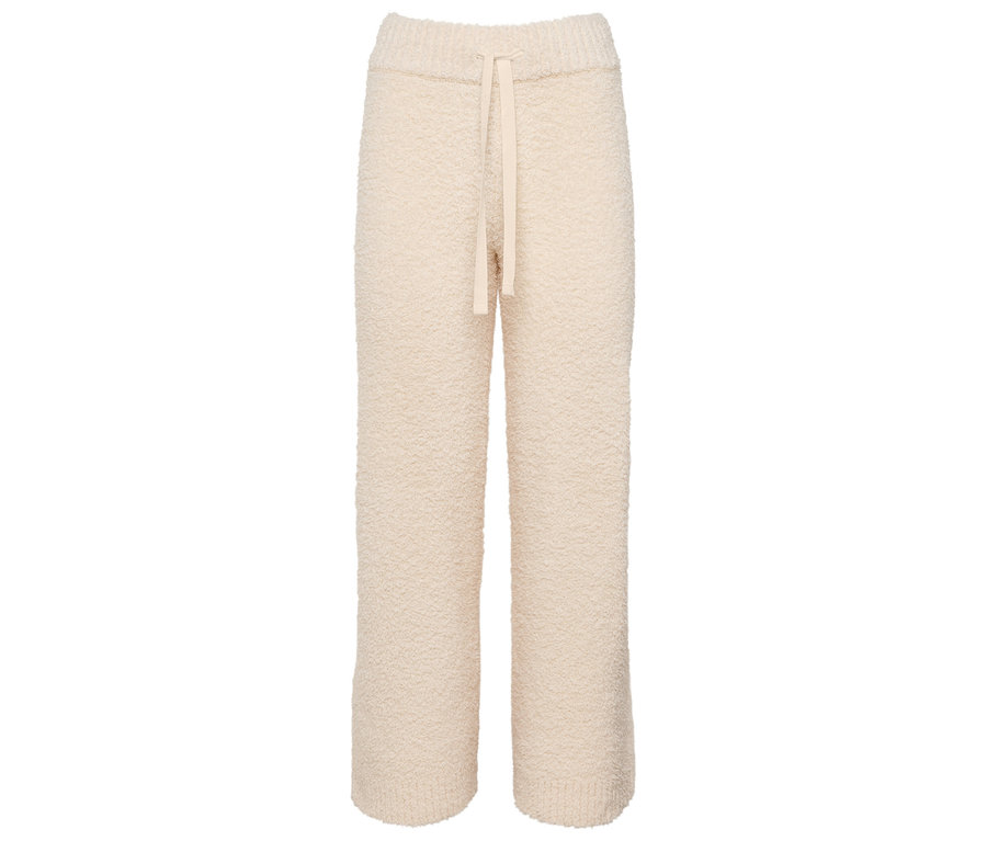 Pantalon en maille couleur crème avec cordon de serrage.