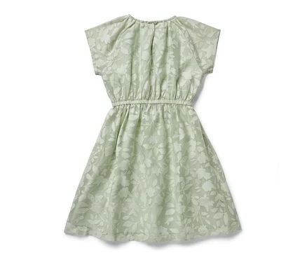 Robe pour enfant verte avec motif floral.