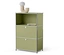 Armoire verte avec deux tiroirs et une étagère supérieure ouverte avec un livre et une lampe décorative.