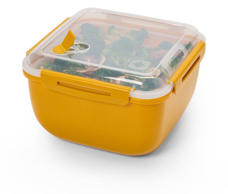 Boîte à déjeuner jaune avec brocoli et champignons.