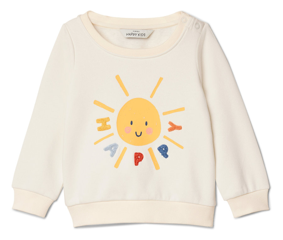 Un sweat-shirt crème avec un imprimé de soleil jaune avec le mot HAPPY.