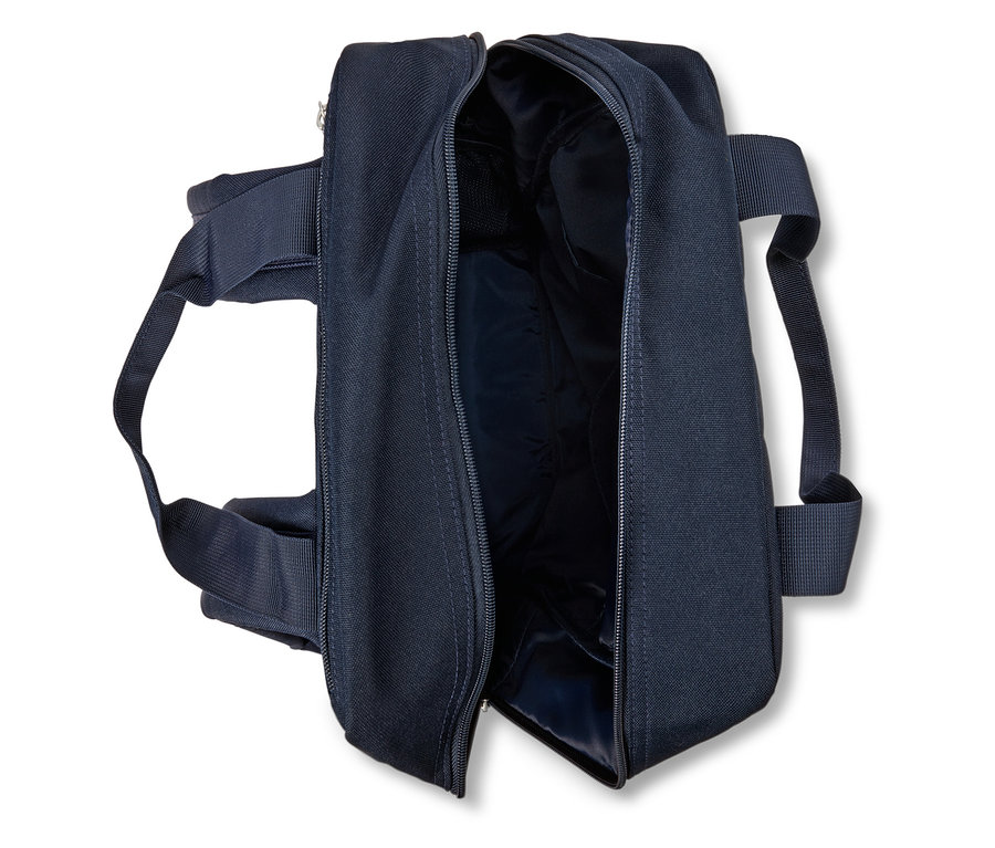 Sac fourre-tout bleu marine avec fermeture éclair ouverte, doublure intérieure visible.