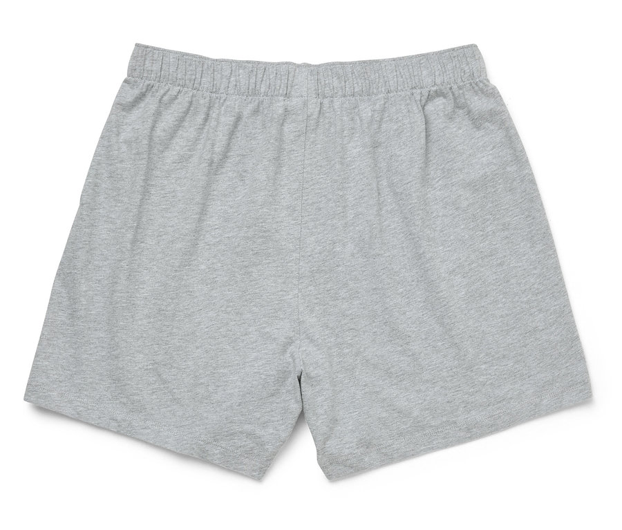 Un short gris avec une taille élastique posé sur un fond blanc.