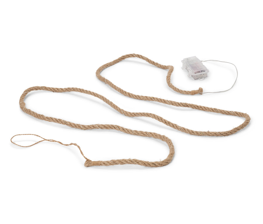 Une corde beige repose sur un fond blanc. À une extrémité se trouve un boîtier de batterie transparent avec un câble blanc.