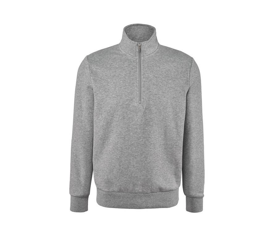 Pull camionneur matelassé gris avec une courte fermeture éclair.