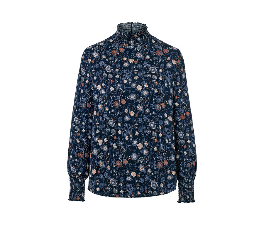 Blouse à fleurs avec col montant.