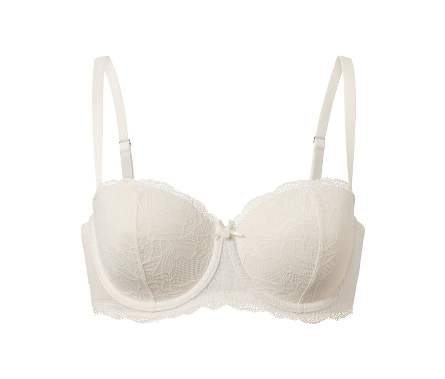 Soutien-gorge multiposition blanc avec bordure en dentelle et un nœud au centre.