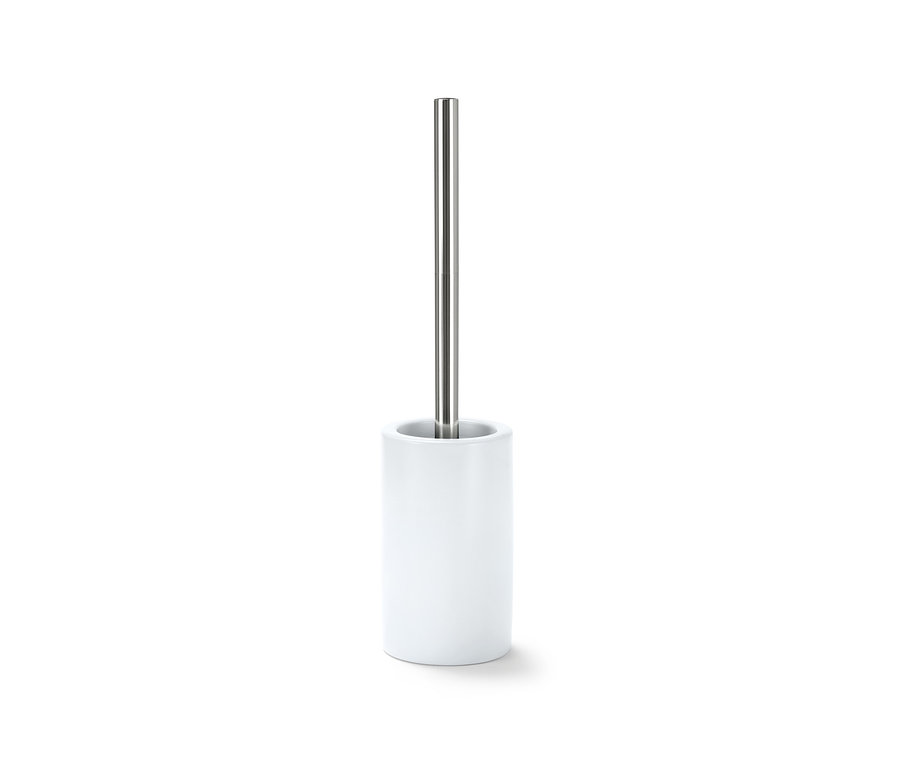 Brosse de toilette blanche avec manche argenté.