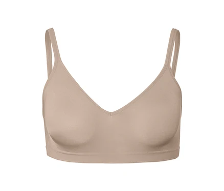 Gros plan d'un soutien-gorge doux sans coutures, beige.
