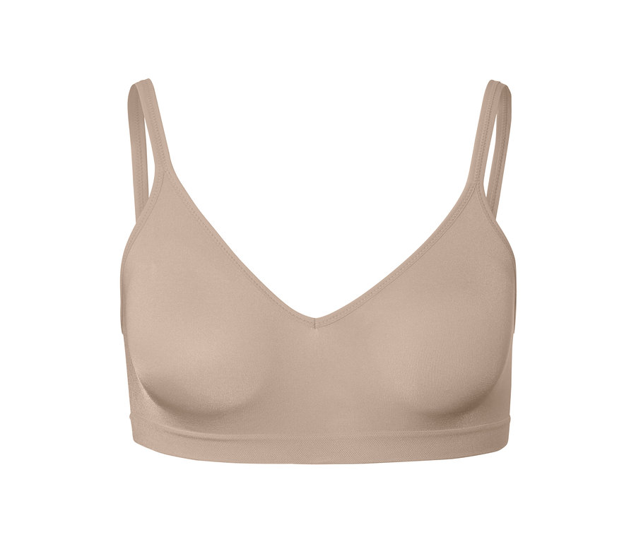 Gros plan d'un soutien-gorge doux sans coutures, beige.