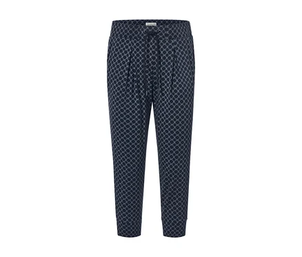 Un pantalon 3/4 en jersey imprimé.