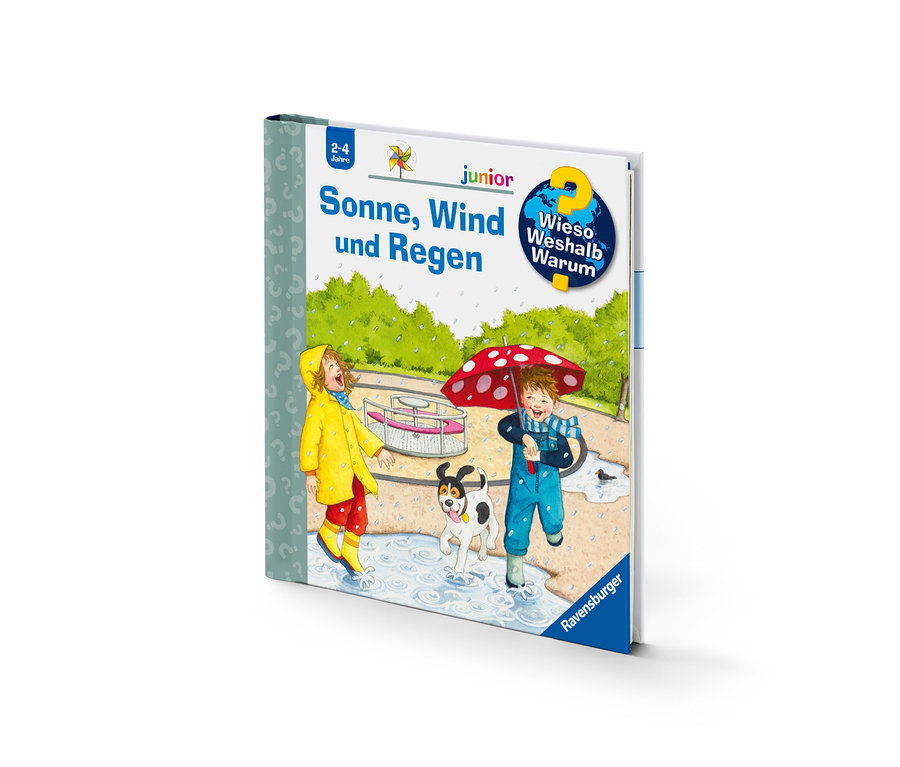 Image du livre « Soleil, vent et pluie » montrant des enfants jouant sous la pluie.
