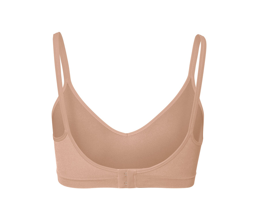 Gros plan d'un soutien-gorge doux sans coutures beige.