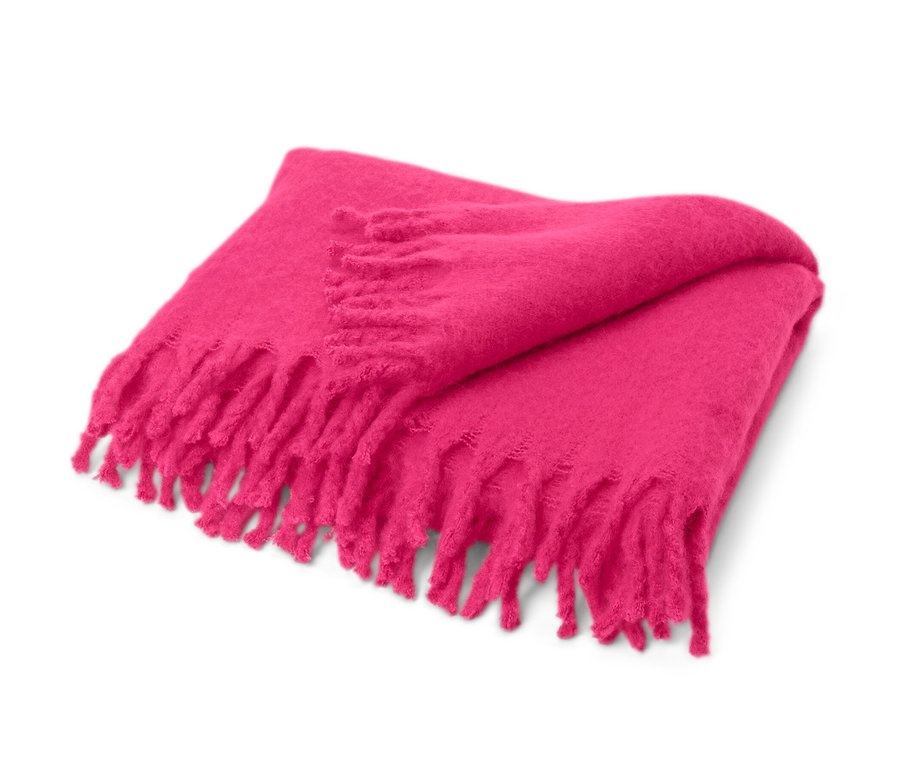 Couverture rose vif, env. 130 x 150 cm, à franges sur fond blanc.