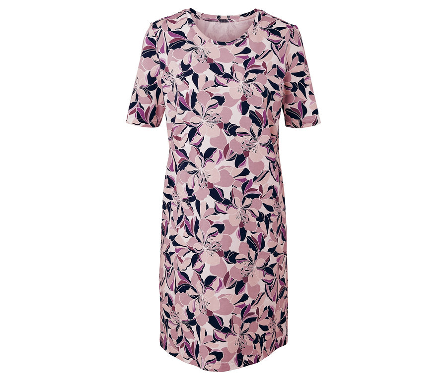 Robe rose à manches courtes avec motif floral.