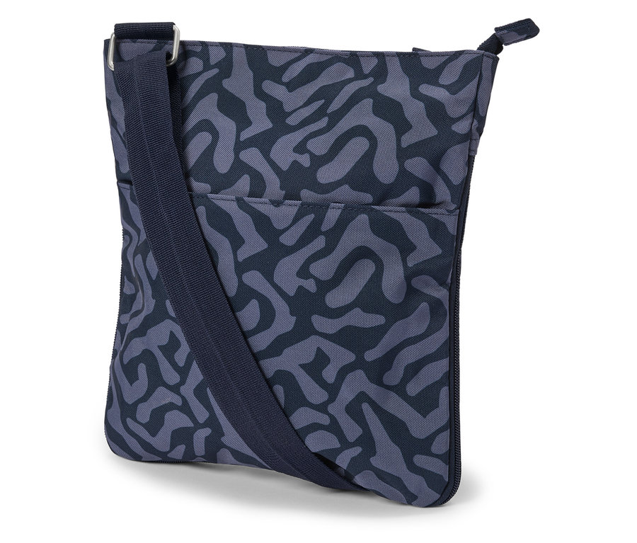 Gros plan d'un sac à bandoulière bleu marine avec un motif abstrait et une fermeture éclair.