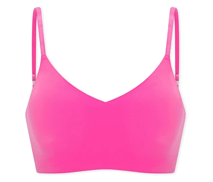 Une brassière invisible SCHIESSER rose avec coussinets sur fond blanc.