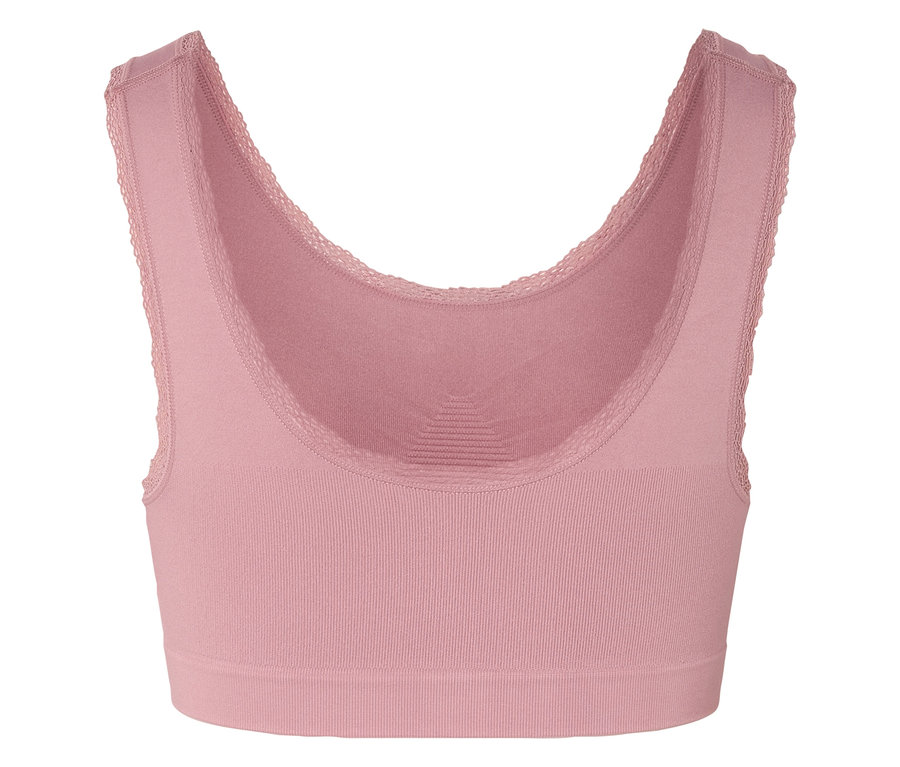Soutien-gorge de sport rose avec bordure en dentelle.