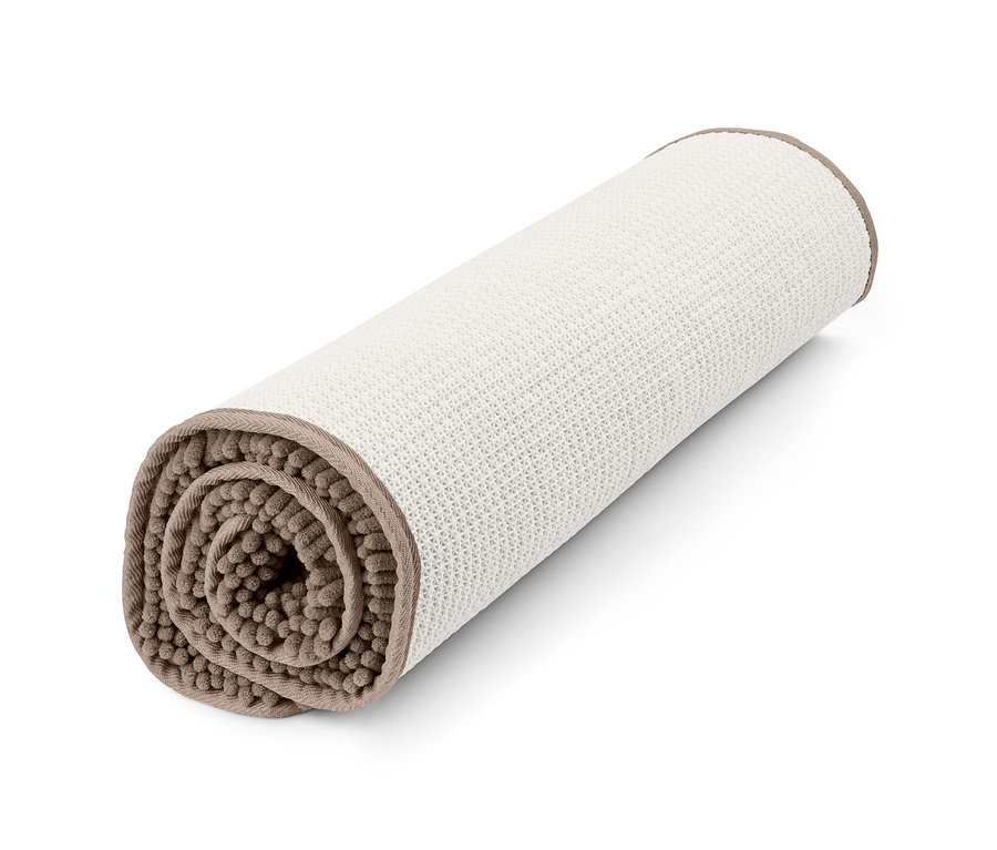 Une couverture pour chien à séchage rapide, enroulée.