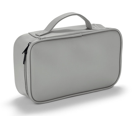 Trousse de voyage grise pour sèche-cheveux et fer à lisser avec fermeture éclair.