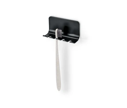 Porte-brosses à dents avec une brosse à dents.