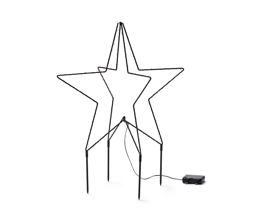 Une étoile à LED en métal pour l’extérieur se dresse sur un fond blanc.