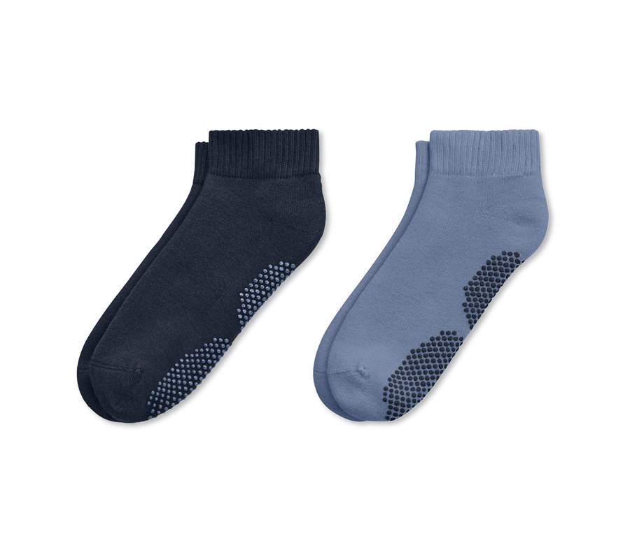 Deux paires de chaussettes de yoga bleues et bleu marine.