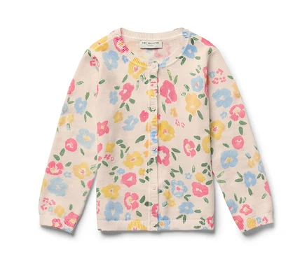 Une jaquette en maille pour enfant avec un motif floral sur un fond clair.