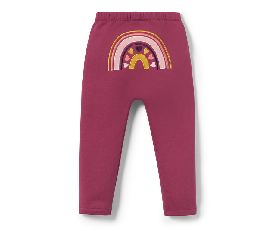 Pantalon en sweat bordeaux pour bébé avec un arc-en-ciel.