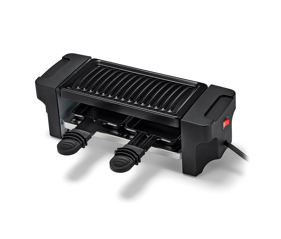 Gril à raclette noir pour 2 personnes avec revêtement antiadhésif et deux poêlons.