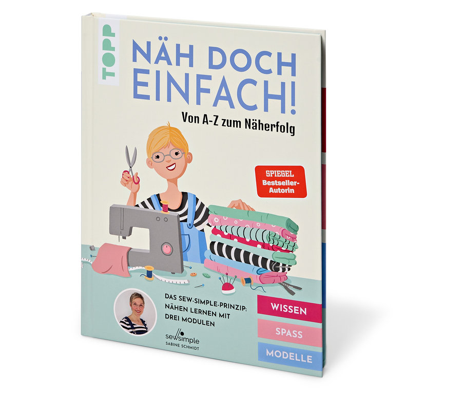 Livre « Näh doch einfach » avec un dessin d'une couturière, une machine à coudre et des tissus.