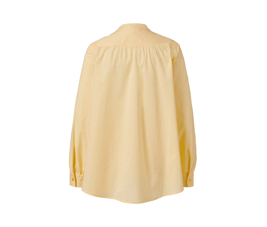 Vue arrière d'un chemisier en popeline jaune clair.