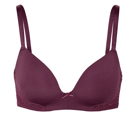 Soutien-gorge violet avec dentelle et un nœud au centre.