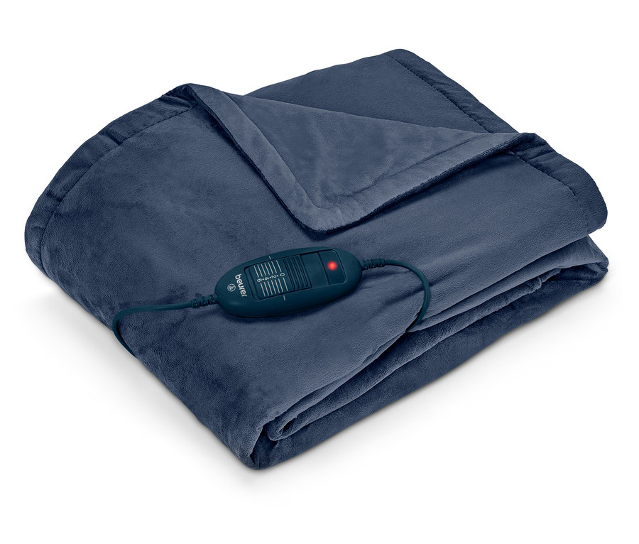 Couverture chauffante bleu foncé pliée avec contrôleur Beurer et voyant rouge.