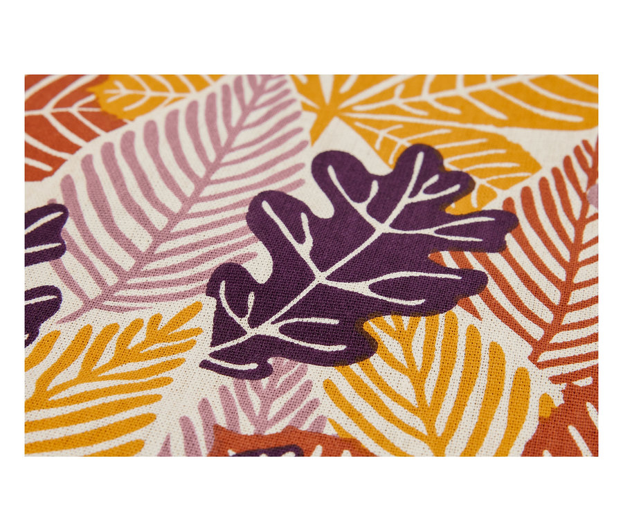 Gros plan d'un tissu imprimé avec des feuilles aux couleurs d'automne.