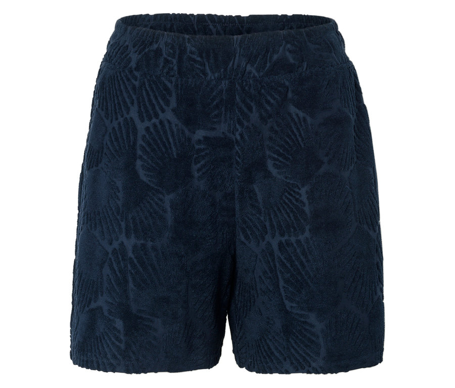 Gros plan d'un short bleu marine avec une ceinture élastique et un motif de palmier.
