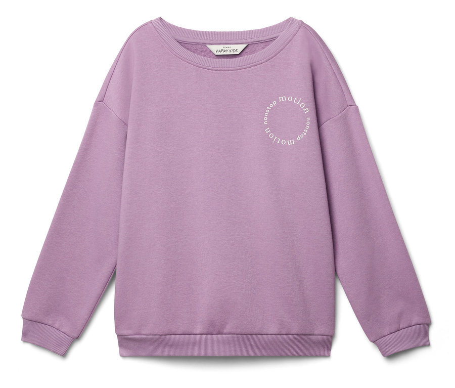 Un sweat-shirt lilas avec l'inscription "nonstop motion" en cercle est posé sur un fond blanc.