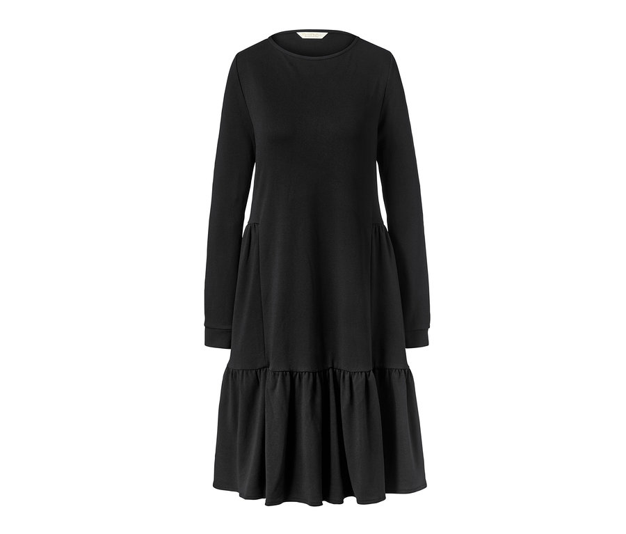 Robe molletonnée noire à volant.