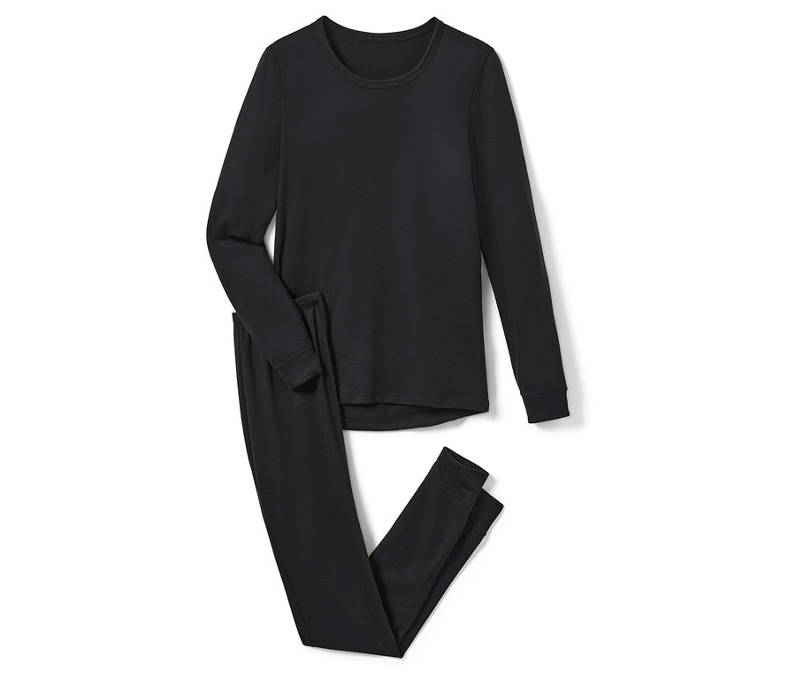 Un ensemble de sous-vêtements techniques thermiques noirs est posé sur un fond blanc.