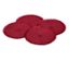 Quatre sets de table rouges.
