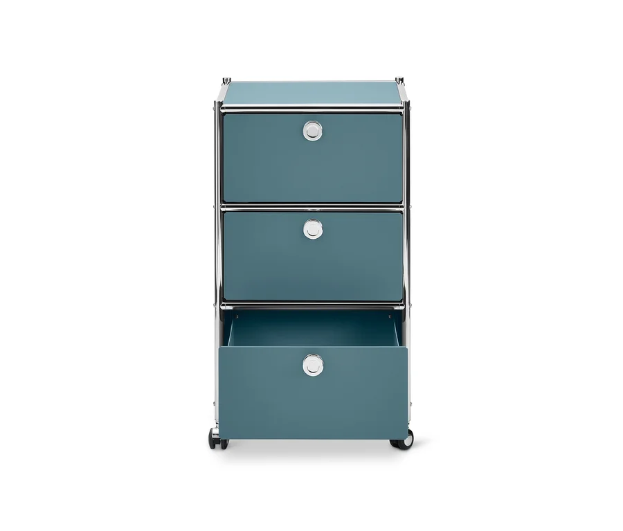 Caisson à roulettes « CN3 » gris bleu avec 3 tiroirs dont un ouvert.