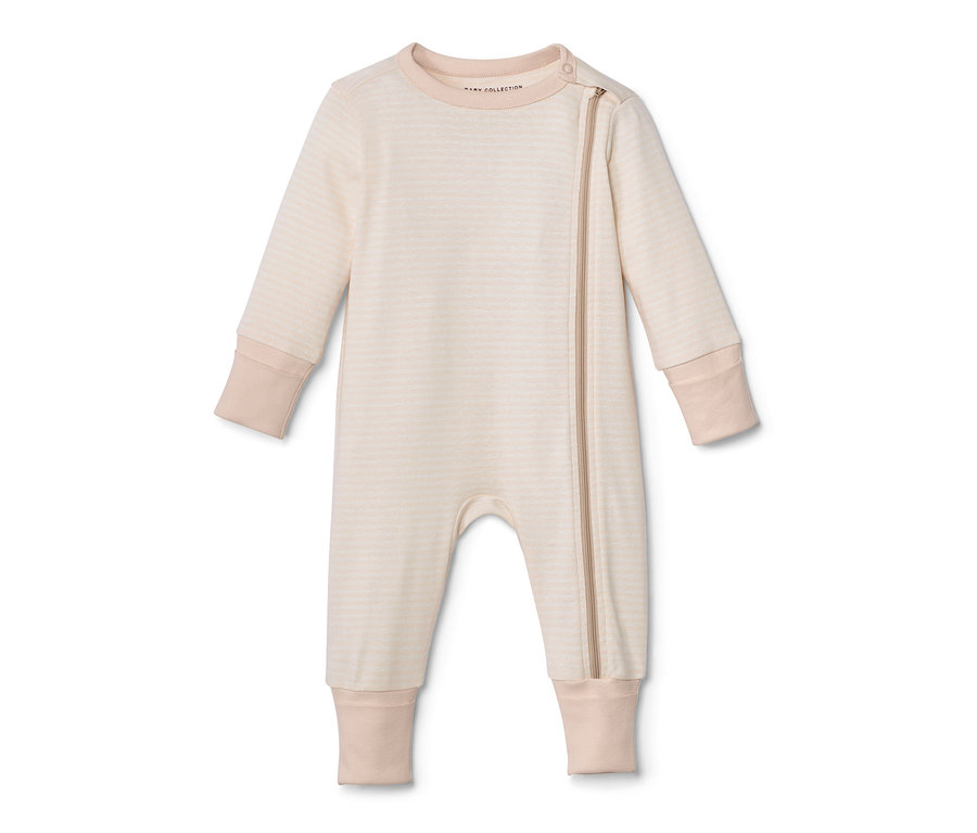 Pyjama rayé beige à manches longues avec fermeture éclair.